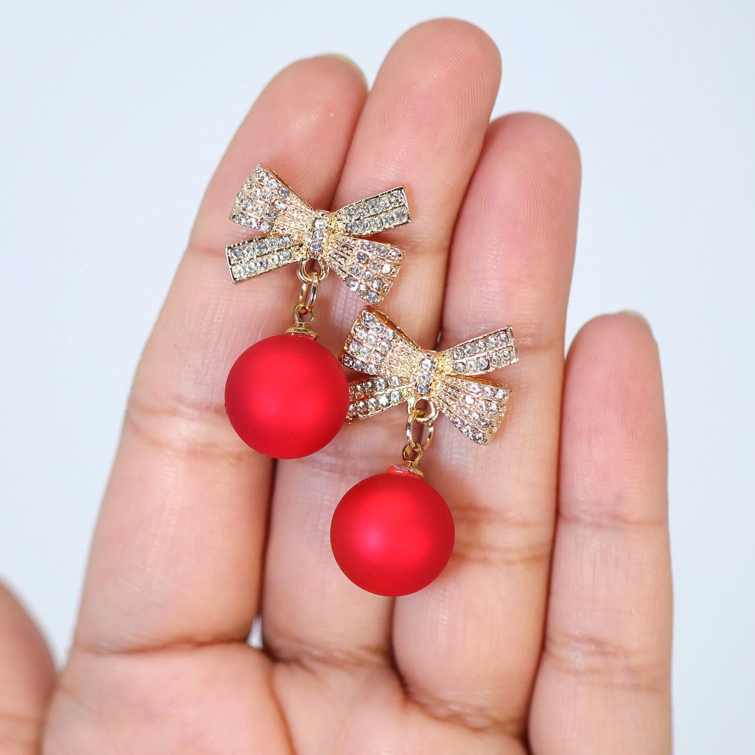 Golden Crystal Bow With Red Bow Drop Christmas earrings, Red Gold Christmas Earrings Statement Christmas earrings.