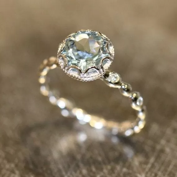 Lovely Simple Elegant Blue Topaz Ring